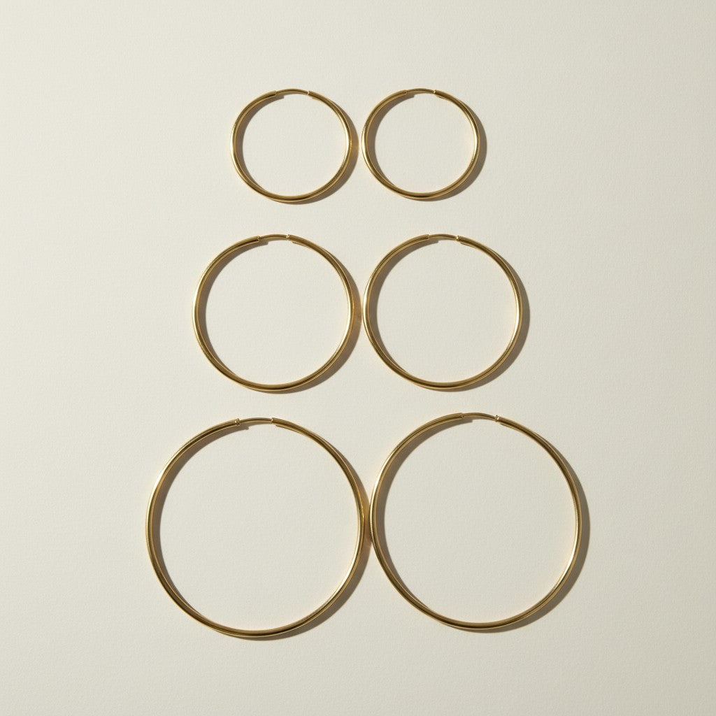 thin gold hoop earrings, endless hoop earrings, large gold hoops, thin wire hoop earrings, classic gold hoops, lightweight hoop earrings, simple gold hoops, everyday gold hoops, minimalist hoops, sleeper hoops, polished gold hoops, hoop size guide, gift for her