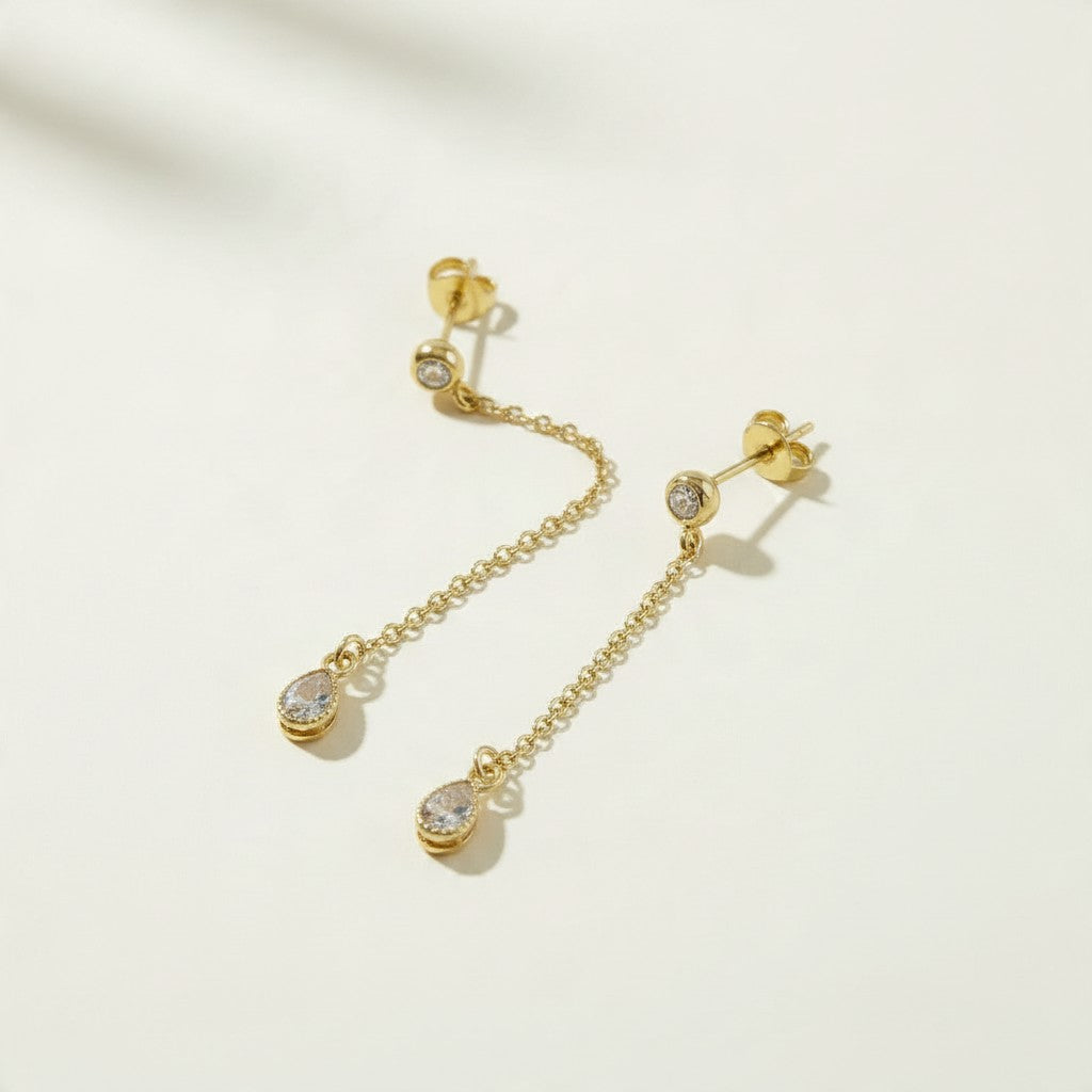 gold chain drop earrings, pear drop earrings, crystal drop stud earrings, dainty dangle earrings, bridal drop earrings, teardrop crystal earrings, gold chain dangle earrings, cubic zirconia drop earrings, delicate gold earrings, wedding earrings, elegant everyday earrings, women’s drop earrings