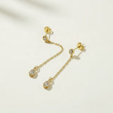 gold chain drop earrings, pear drop earrings, crystal drop stud earrings, dainty dangle earrings, bridal drop earrings, teardrop crystal earrings, gold chain dangle earrings, cubic zirconia drop earrings, delicate gold earrings, wedding earrings, elegant everyday earrings, women’s drop earrings