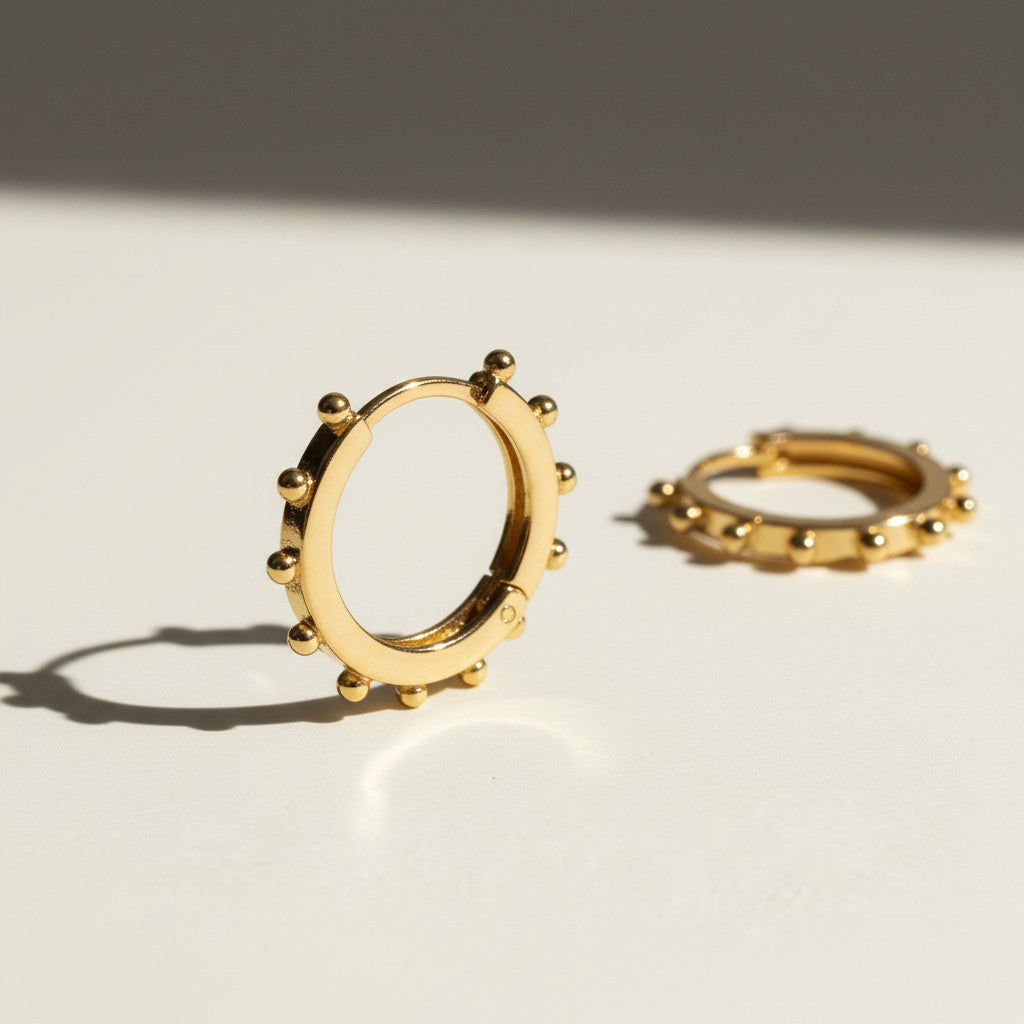 beaded hoop earrings, studded gold hoops, 18K gold overlay hoop earrings, textured hoop earrings, statement hoop earrings, small gold hoops, bead detail earrings, hoop earrings flat lay