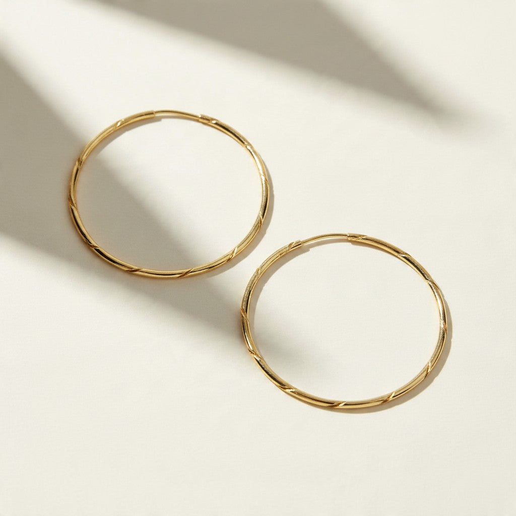 gold endless hoop earrings, textured gold hoops, diamond-cut hoop earrings, thin gold hoops, lightweight hoop earrings, twist hoop earrings, minimalist gold hoops, everyday hoop earrings, sleeper hoops, small and large gold hoops, hoop earrings size guide, women’s gold hoops
