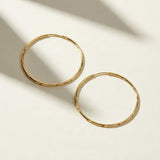 gold endless hoop earrings, textured gold hoops, diamond-cut hoop earrings, thin gold hoops, lightweight hoop earrings, twist hoop earrings, minimalist gold hoops, everyday hoop earrings, sleeper hoops, small and large gold hoops, hoop earrings size guide, women’s gold hoops