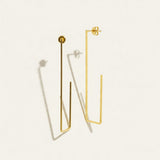 gold rectangle earrings, long geometric earrings, minimalist gold wire earrings, open rectangle hoop earrings, modern gold drop earrings, lightweight statement earrings, architectural earrings, thin gold wire earrings, elongated hoop earrings, contemporary gold jewelry, linear gold earrings, women’s geometric earrings