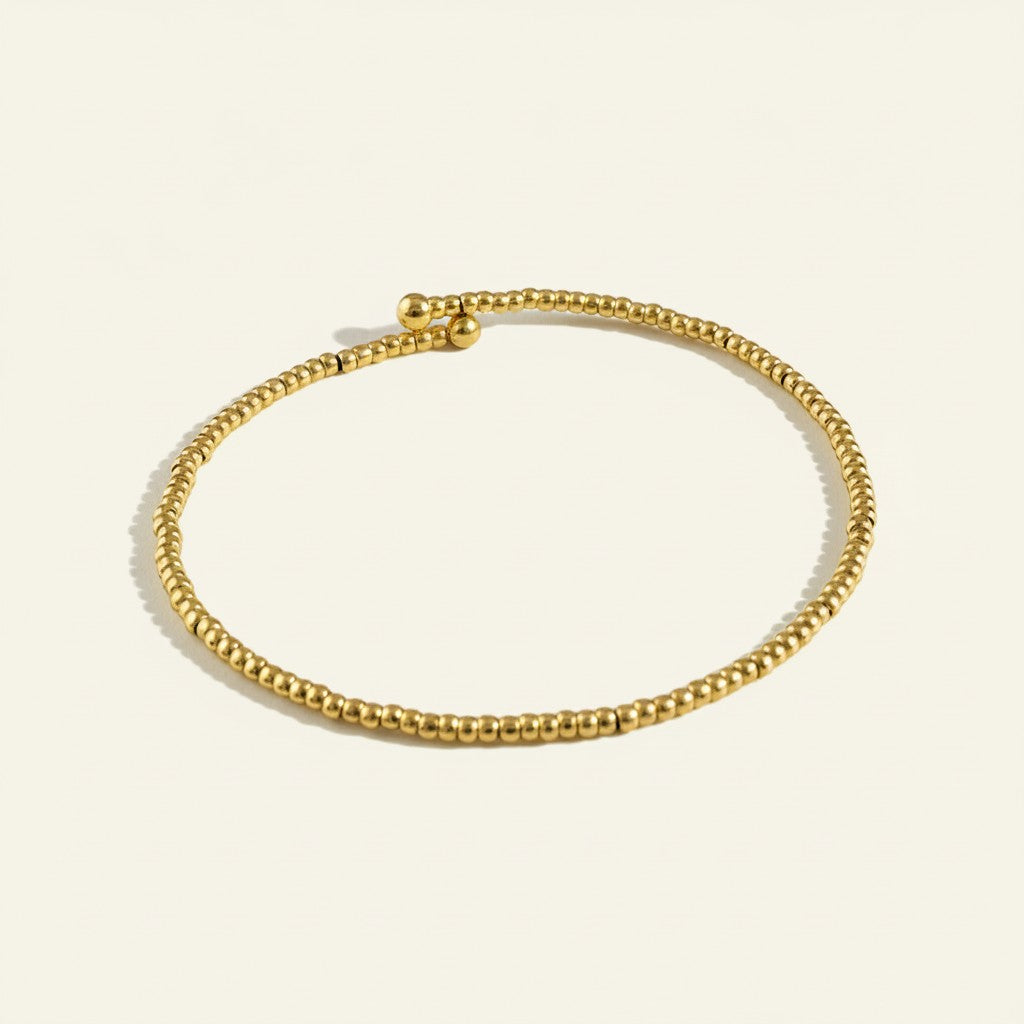 gold beaded stretch bracelet, gold bead bracelet, stretch bracelet gold, minimalist beaded bracelet, stackable gold bracelet, dainty gold bead bracelet, no clasp bracelet, layering bracelet flat lay