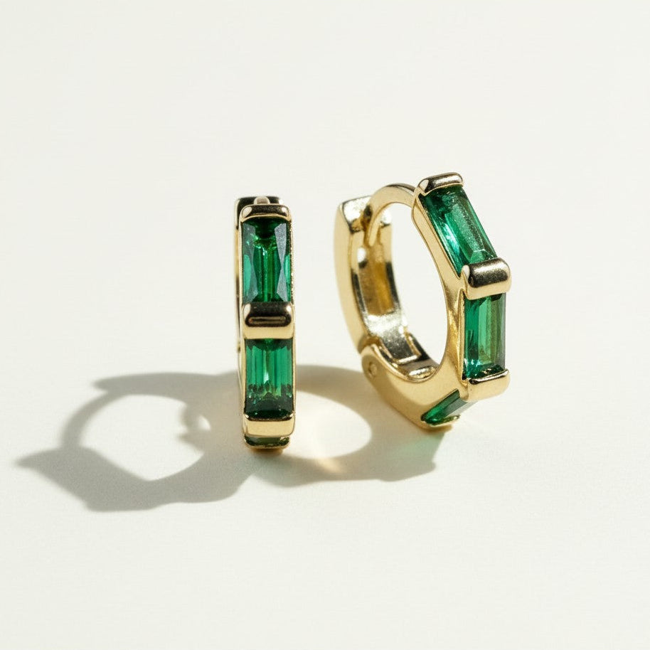 gold baguette hoop earrings, huggie hoops with stones, black baguette earrings, emerald huggie hoops, clear crystal hoop earrings, gold huggie hoops colorways, baguette cut earrings, statement huggie hoops