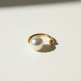 pearl ear cuff, gold ear cuff with pearl, sculptural ear cuff, asymmetric ear cuff, avant-garde pearl jewelry, no-piercing ear cuff, modern pearl earring, artistic gold ear cuff