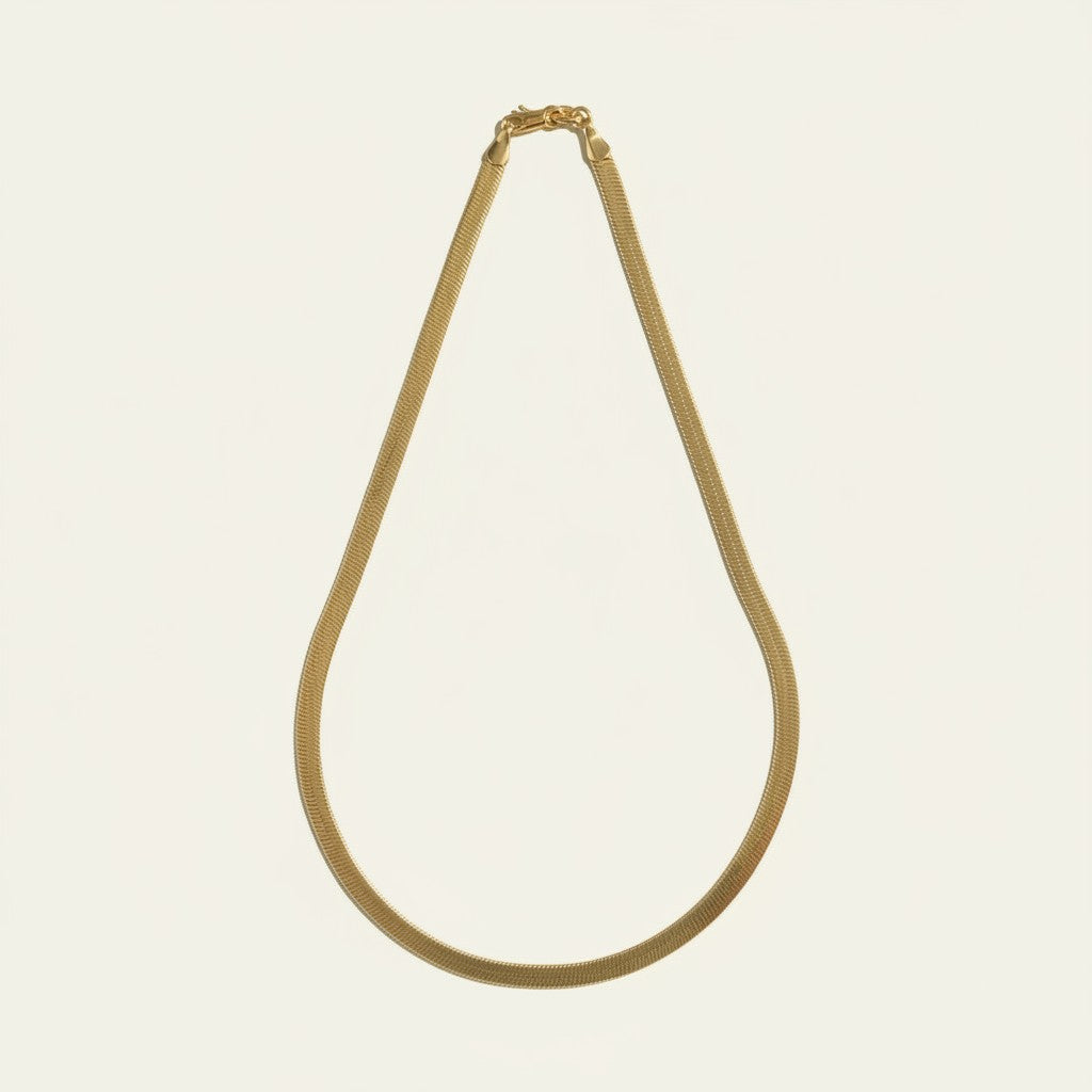 herringbone chain necklace flat lay, 18k gold overlay chain detail, 4mm herringbone chain necklace, gold snake chain necklace, herringbone clasp detail, single strand gold chain, classic herringbone necklace, flat link chain necklace