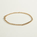 CZ bar bracelet flat lay, cubic zirconia bracelet detail, gold overlay bracelet construction, adjustable CZ bracelet clasp, sparkly bar bracelet, rolo chain CZ bracelet, minimalist gold bracelet, pave CZ bracelet closeup
