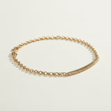 CZ bar bracelet flat lay, cubic zirconia bracelet detail, gold overlay bracelet construction, adjustable CZ bracelet clasp, sparkly bar bracelet, rolo chain CZ bracelet, minimalist gold bracelet, pave CZ bracelet closeup
