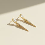 baguette crystal earrings, crystal drop earrings detail, pave spike earrings, gold drop earrings, 18K gold overlay earrings, dainty crystal drop, statement stud earrings, crystal earrings flat lay