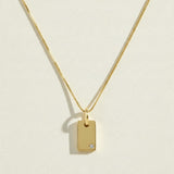 gold tag pendant necklace, rectangle pendant necklace, gold bar pendant necklace, minimalist pendant necklace, box chain necklace, small crystal pendant necklace, dainty gold necklace, gold-tone layering necklace, personalized pendant necklace, engravable pendant necklace, everyday gold necklace, gift for her jewelry
