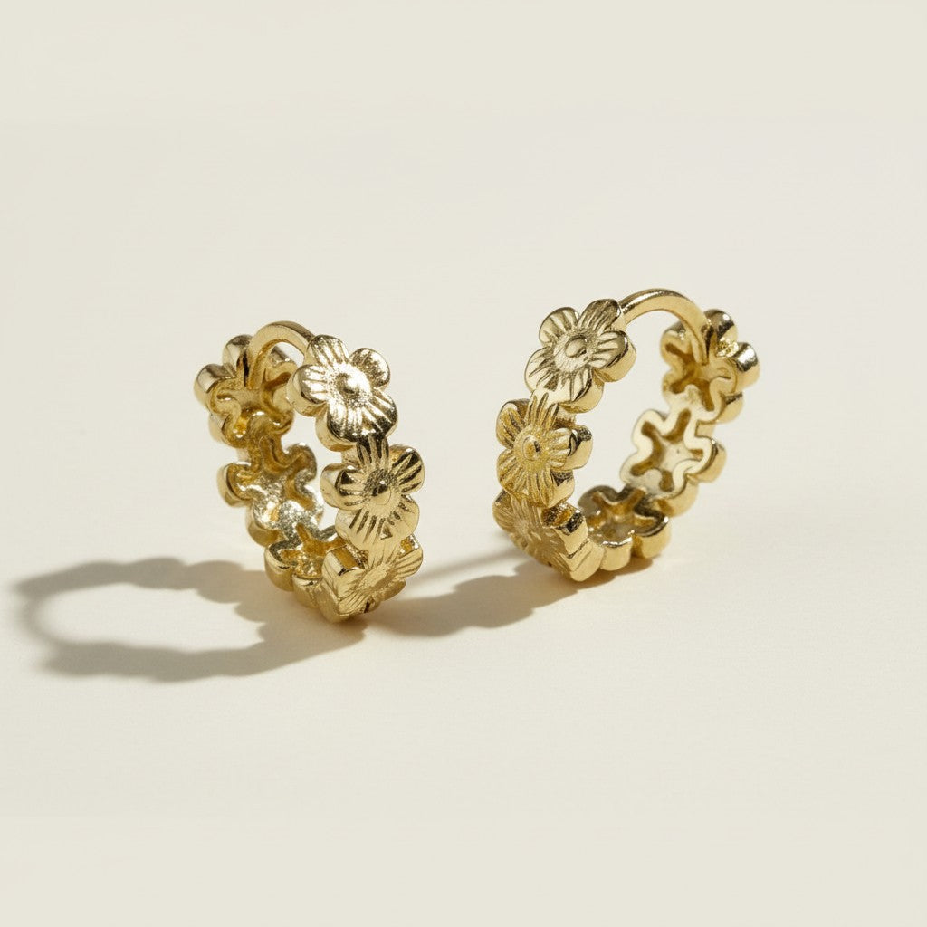 gold flower huggie hoop earrings, daisy hoop earrings, floral huggie earrings, small gold flower hoops, textured flower earrings, dainty floral hoops, garden jewelry, nature-inspired earrings, gold huggie earrings, spring floral jewelry, bridesmaid gift, gift for her