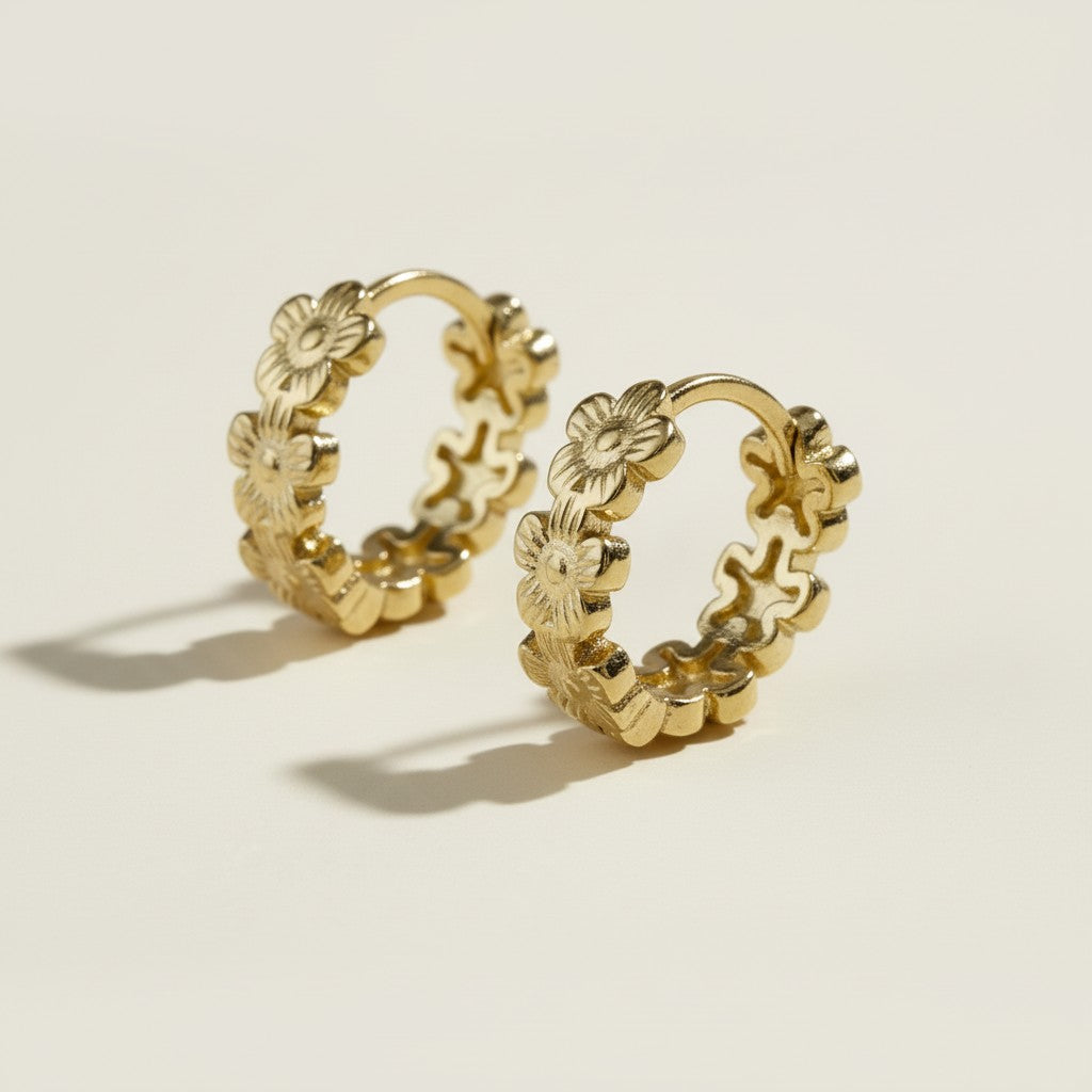 gold flower huggie hoop earrings, daisy hoop earrings, floral huggie earrings, small gold flower hoops, textured flower earrings, dainty floral hoops, garden jewelry, nature-inspired earrings, gold huggie earrings, spring floral jewelry, bridesmaid gift, gift for her