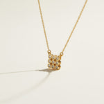 pave cluster pendant necklace, crystal pendant necklace detail, bezel set pendant, 18K gold overlay necklace, dainty crystal necklace, minimalist pendant necklace, sparkly pendant flat lay, cable chain necklace