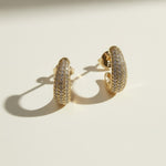 textured gold hoop earrings flat lay, pave dome hoop earrings, sparkly textured hoops detail, micro CZ gold hoops, stardust texture earrings, tapered gold huggie hoops, sugared gold earrings, statement pave hoops