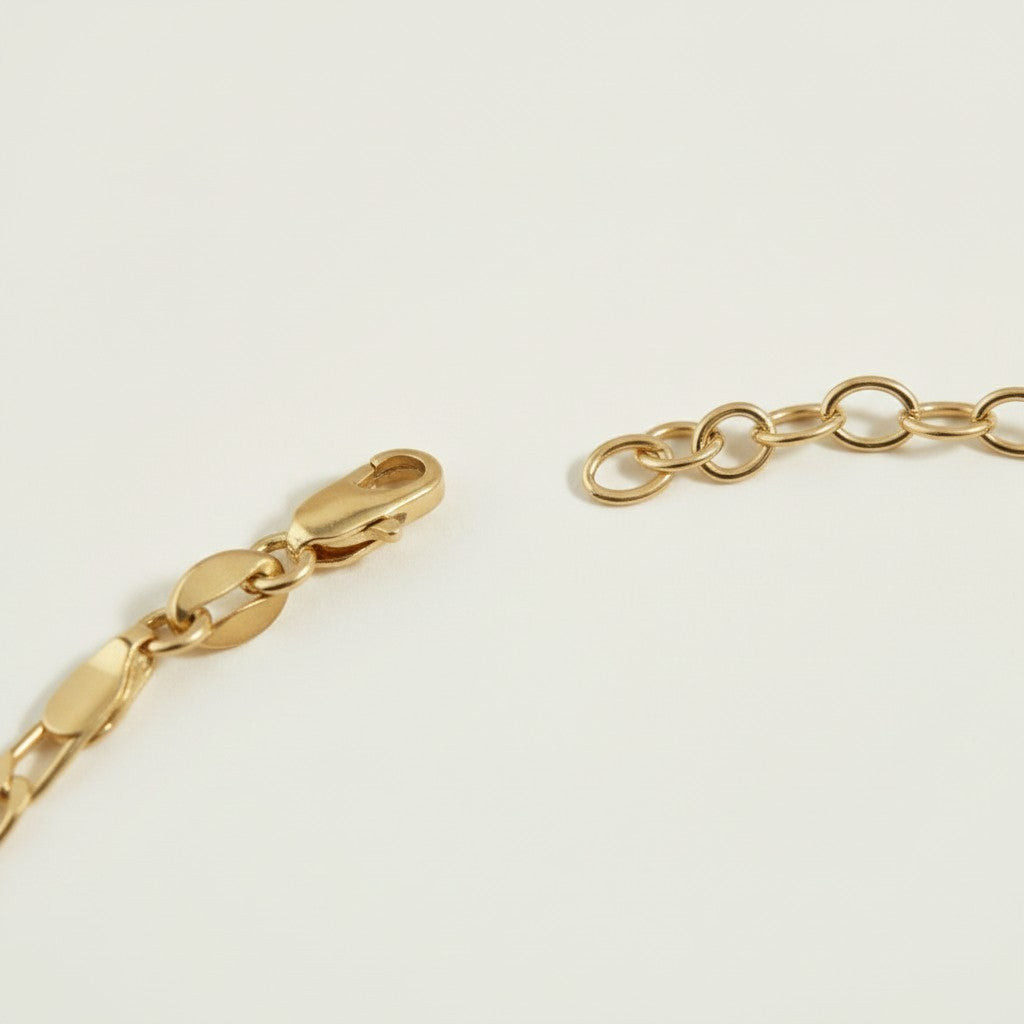 gold figaro chain necklace, figaro link necklace, classic gold chain, adjustable gold necklace, layering chain necklace, flat link necklace, everyday gold jewelry, statement chain necklace