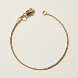 round snake chain bracelet, gold snake chain bracelet, smooth round chain bracelet, 18k gold overlay bracelet, flexible gold bracelet, minimalist snake chain, delicate round chain bracelet, gold chain clasp detail