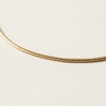 round snake chain bracelet, gold snake chain bracelet, smooth round chain bracelet, 18k gold overlay bracelet, flexible gold bracelet, minimalist snake chain, delicate round chain bracelet, gold chain clasp detail