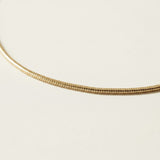 round snake chain bracelet, gold snake chain bracelet, smooth round chain bracelet, 18k gold overlay bracelet, flexible gold bracelet, minimalist snake chain, delicate round chain bracelet, gold chain clasp detail