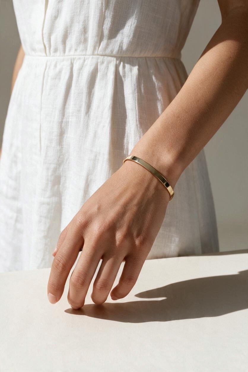 gold cuff bracelet, slim open cuff bracelet, flat gold bangle, minimalist gold bracelet, polished gold cuff, adjustable cuff bracelet, everyday gold bracelet, dainty wrist jewelry, stackable bracelet, modern gold jewelry, women’s gold cuff, simple gold bracelet