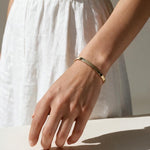 gold cuff bracelet, slim open cuff bracelet, flat gold bangle, minimalist gold bracelet, polished gold cuff, adjustable cuff bracelet, everyday gold bracelet, dainty wrist jewelry, stackable bracelet, modern gold jewelry, women’s gold cuff, simple gold bracelet