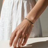 gold cuff bracelet, slim open cuff bracelet, flat gold bangle, minimalist gold bracelet, polished gold cuff, adjustable cuff bracelet, everyday gold bracelet, dainty wrist jewelry, stackable bracelet, modern gold jewelry, women’s gold cuff, simple gold bracelet
