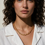 faceted cable chain necklace, layered gold chains, gold cable chain set, graduated length necklaces, oval link chain necklace, layering chain necklaces, everyday gold chain stack, link chain detail