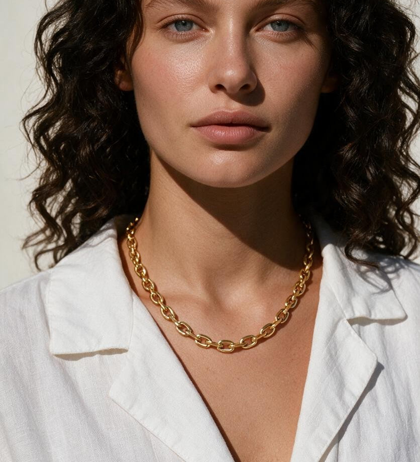 faceted cable chain necklace, layered gold chains, gold cable chain set, graduated length necklaces, oval link chain necklace, layering chain necklaces, everyday gold chain stack, link chain detail