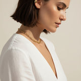gold ear cuff on model, chunky ear cuff worn profile, no piercing ear cuff fit, gold cartilage cuff styled, statement ear cuff close-up, wide gold ear cuff lifestyle photo
