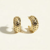 chunky gold hoop earrings, dome hoop earrings, crystal c hoop earrings, thick gold huggie earrings, chunky half hoop earrings, sparkly gold hoops, statement huggie earrings, lightweight chunky hoops, cubic zirconia hoop earrings, gold dome earrings, bold gold earrings, women’s chunky hoops