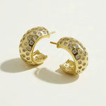 chunky gold hoop earrings, dome hoop earrings, crystal c hoop earrings, thick gold huggie earrings, chunky half hoop earrings, sparkly gold hoops, statement huggie earrings, lightweight chunky hoops, cubic zirconia hoop earrings, gold dome earrings, bold gold earrings, women’s chunky hoops