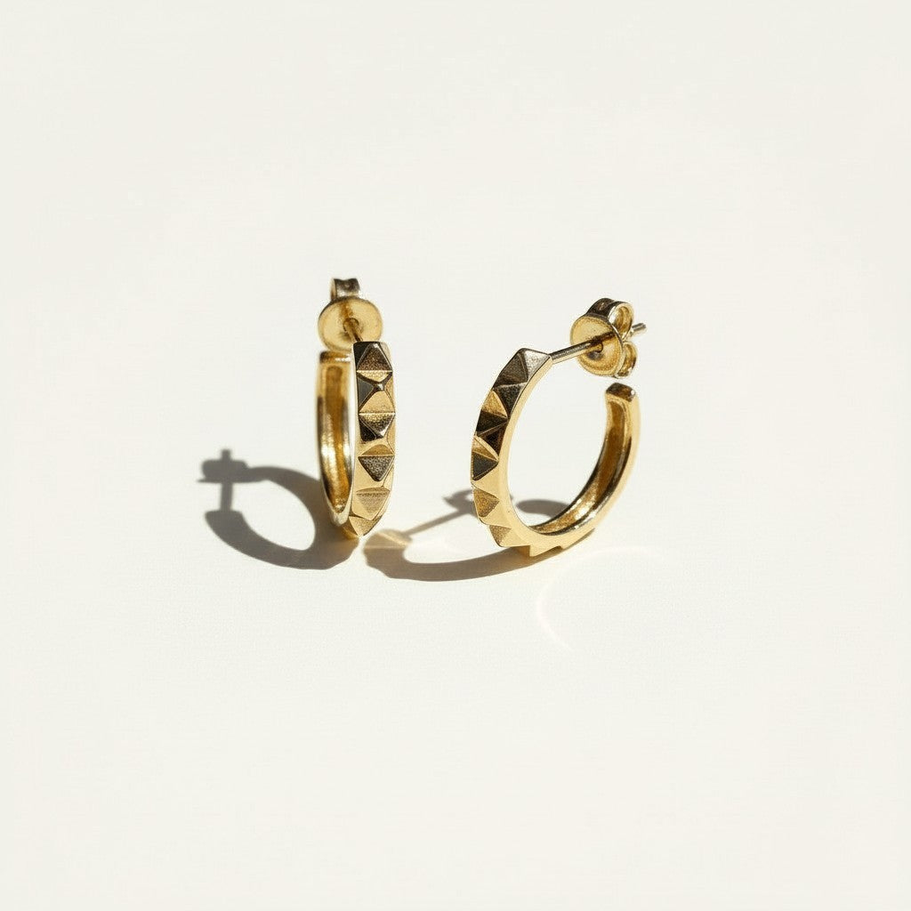 gold pyramid hoop earrings, textured huggie hoops, geometric stud hoops, edgy gold hoop earrings, pyramid stud earrings, small gold hoops, statement huggie earrings, chunky textured hoops