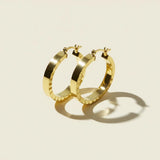 gold flat hoop earrings, wide band hoop earrings, ridged edge hoop earrings, textured gold hoops, scalloped hoop earrings, medium gold hoops, polished gold hoop earrings, hinged hoop earrings, statement hoops, everyday gold hoops, modern hoop earrings, gift for her