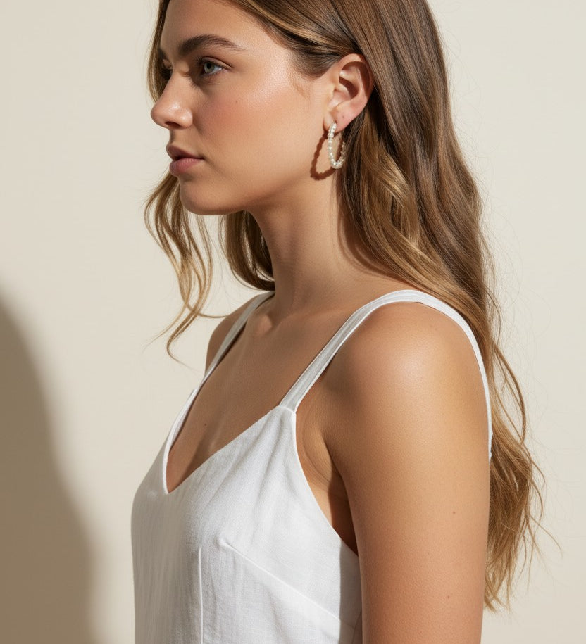 pearl hoop earrings worn, pearl earrings on model multiple hairstyles, classic pearl hoops lifestyle photo, wedding pearl earrings styled, freshwater pearl hoops fit, timeless pearl earrings close-up