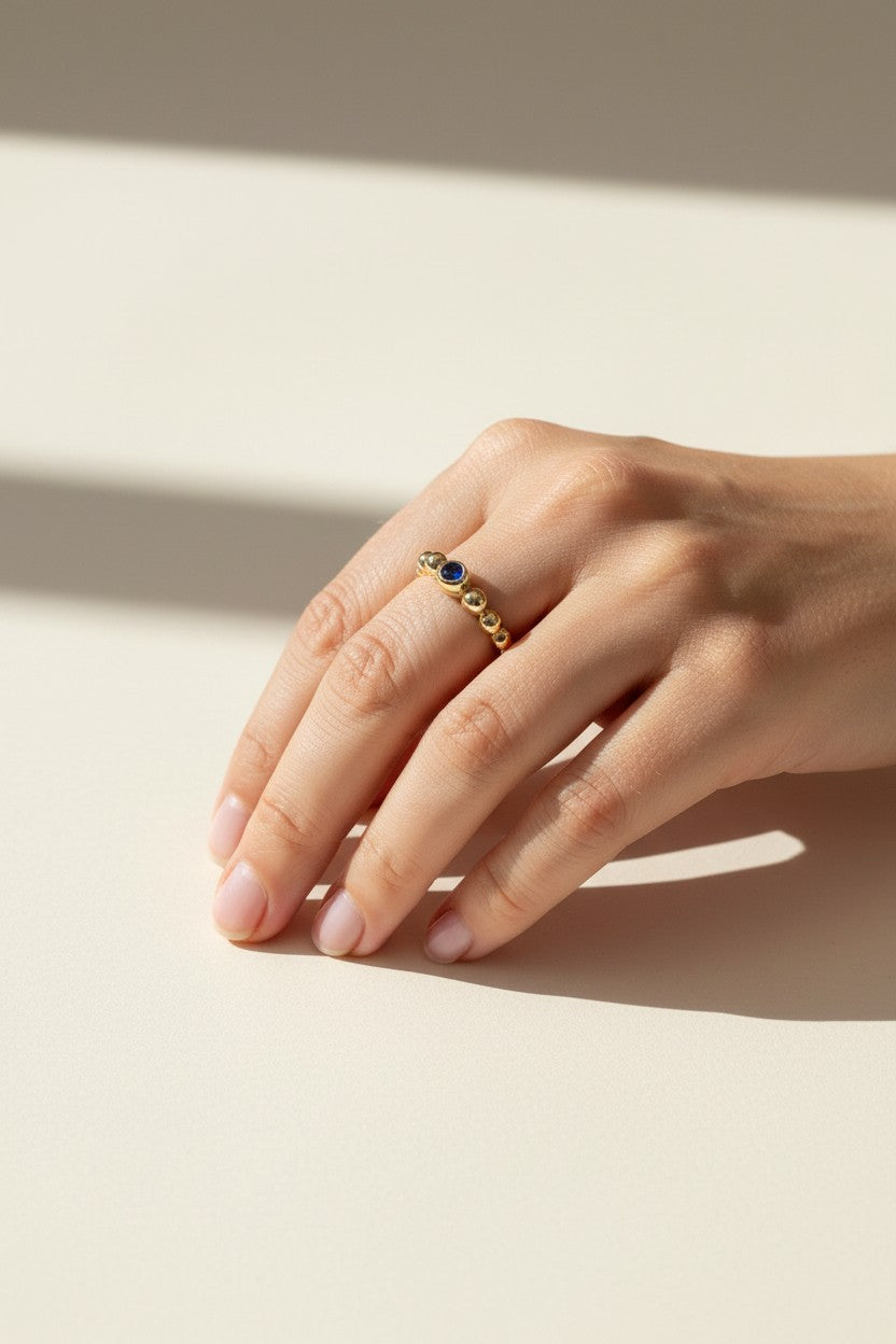 sapphire beaded ring, gold bubble ring, blue sapphire gold ring, beaded band ring, stacking gold ring, statement sapphire ring, textured gold ring, on-model ring photography