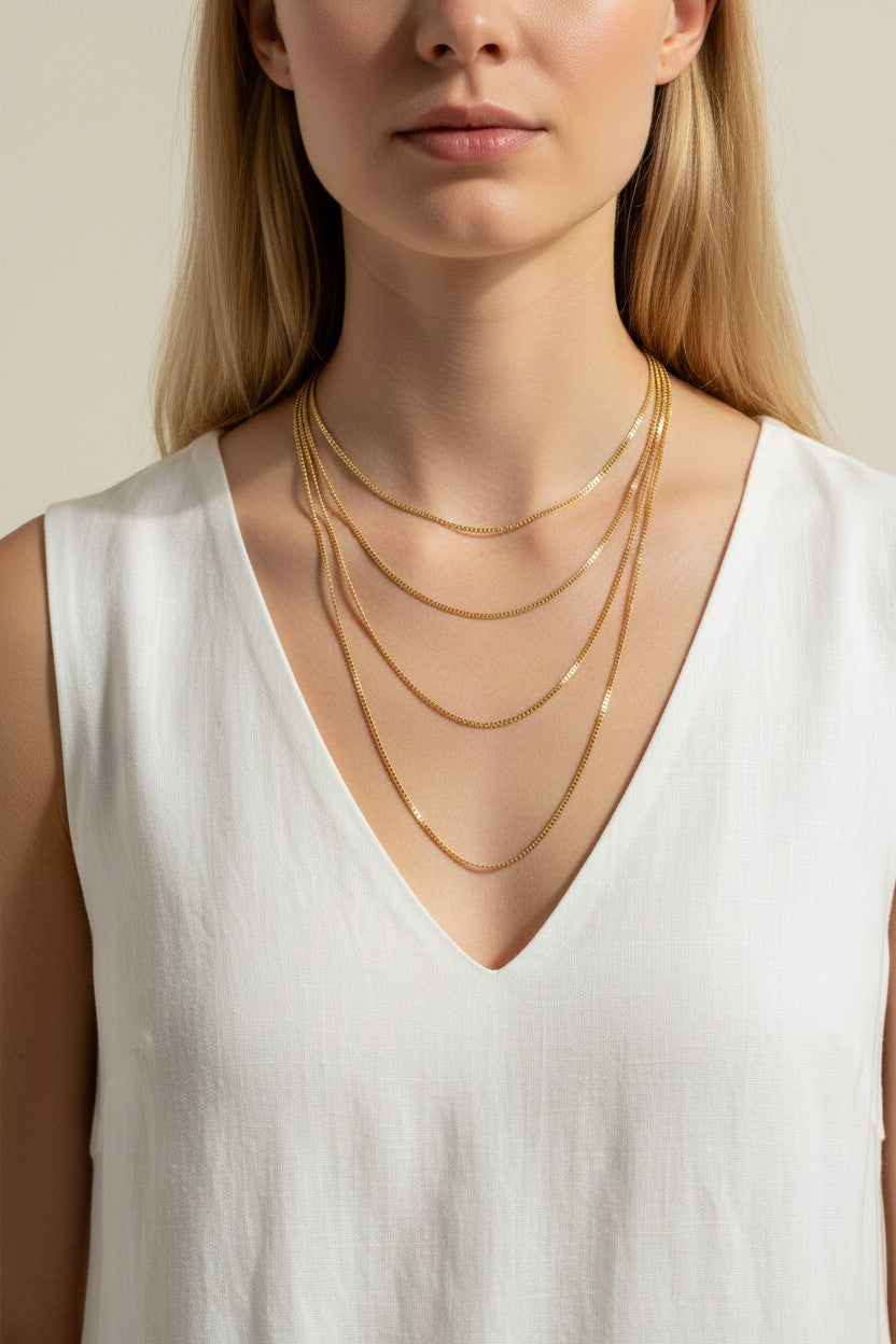 mariner chain necklace on-model, anchor link necklace gold, 18K gold overlay chain, nautical chain necklace, layered mariner chain, statement link necklace, textured gold chain, mariner necklace close-up