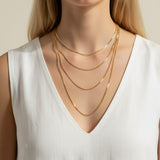 mariner chain necklace on-model, anchor link necklace gold, 18K gold overlay chain, nautical chain necklace, layered mariner chain, statement link necklace, textured gold chain, mariner necklace close-up