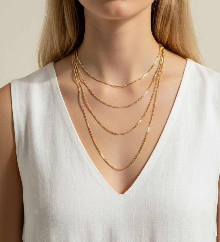 mariner chain necklace on-model, anchor link necklace gold, 18K gold overlay chain, nautical chain necklace, layered mariner chain, statement link necklace, textured gold chain, mariner necklace close-up