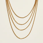layered box chain necklace, gold chain set flat lay, 18K gold overlay layered necklace, graduated chain necklace, multi-strand gold necklace, dainty layered necklace, waterfall chain necklace, layered necklace set