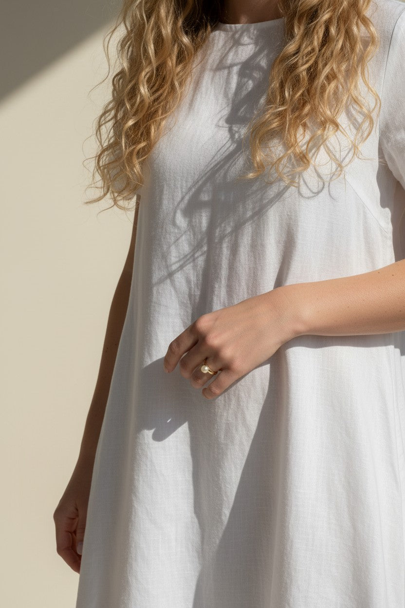 gold pearl ring worn, pearl ring on hand fit, gold filled ring lifestyle photo, minimalist pearl ring styled, freshwater pearl ring close-up, domed pearl ring on finger