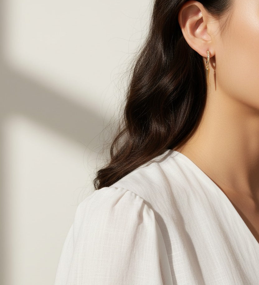spike drop earrings, pave huggie earrings, gold spike earrings, minimalist drop earrings, huggie hoop with charm, edgy gold earrings, dainty spike jewelry, drop earrings on-model