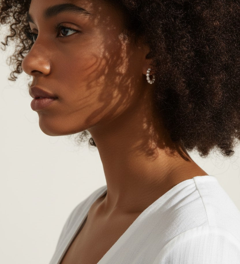 pearl hoop earrings on model, small pearl hoops lifestyle, freshwater pearl earrings, gold and pearl hoop earrings, dainty pearl earrings, pearl huggie earrings, minimalist pearl jewelry, everyday pearl earrings