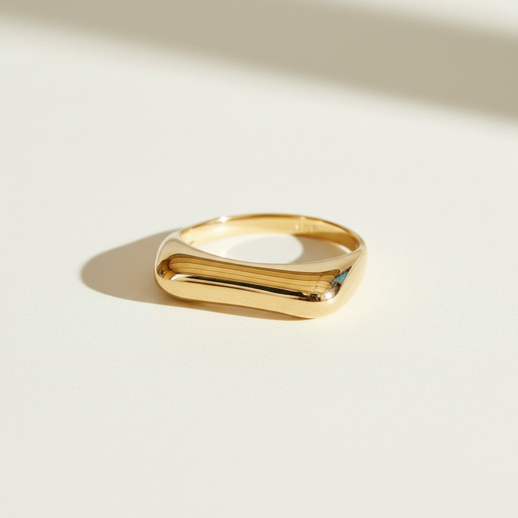vertical bar ring flat lay, gold bar ring detail, minimalist geometric ring, modern stacking ring, architectural gold ring, sleek bar ring, curved band ring, statement bar ring