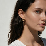 square huggie earrings, chunky gold huggie hoops, geometric hoop earrings, boxy gold hoops, small gold hoop earrings, polished gold huggies, modern huggie hoop earrings, everyday gold hoops