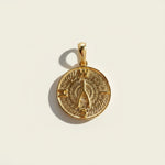gold wishbone pendant, compass coin necklace charm, medallion pendant gold, symbolic jewelry, vintage coin pendant, textured gold pendant, lucky charm necklace, layering pendant