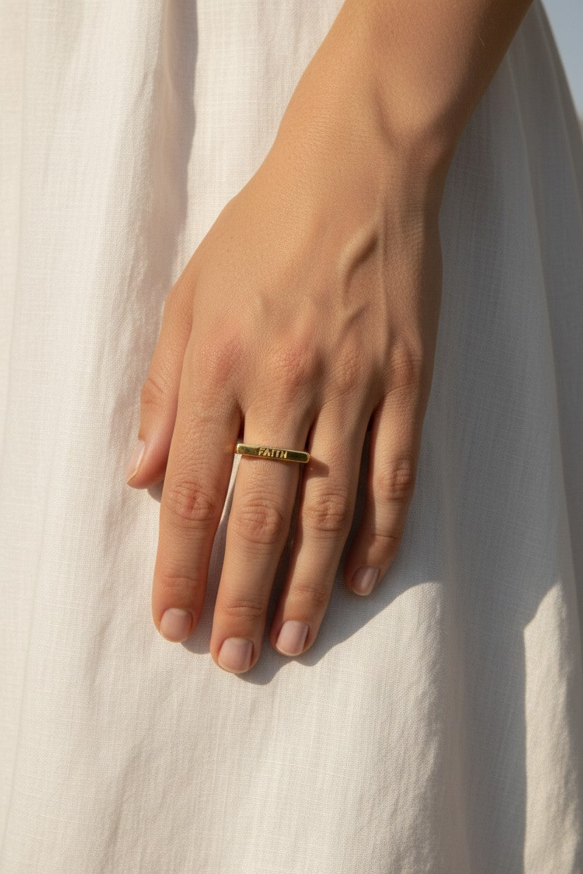 faith ring, word signet ring, engraved gold ring, inspirational jewelry, gold statement ring, personalized word ring, on-model ring photography, meaningful jewelry gift