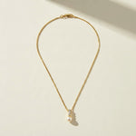 pearl pendant necklace, pearl drop necklace, gold box chain necklace, pearl and crystal necklace, dainty pearl necklace, bridal pearl necklace, classic pearl pendant, gold chain pearl necklace, cubic zirconia pearl pendant, elegant pearl necklace, wedding necklace, women’s pearl pendant necklace