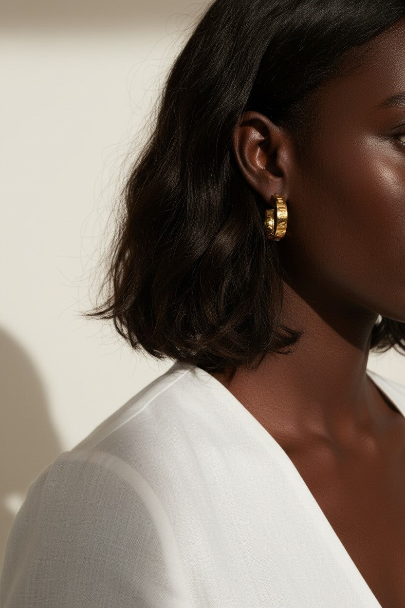 hammered gold hoop earrings, textured hoop earrings, gold huggie hoops, everyday gold earrings, small gold hoops, organic texture earrings, minimalist gold jewelry, on-model earring photography